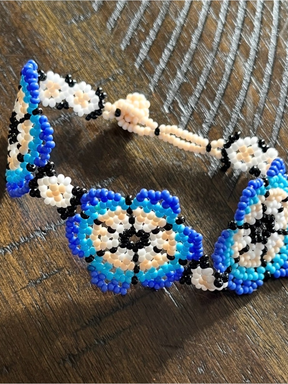 Handmade Mexican Huichol Black, Blue, White, and Cream Seed Bead Floral Bracelet